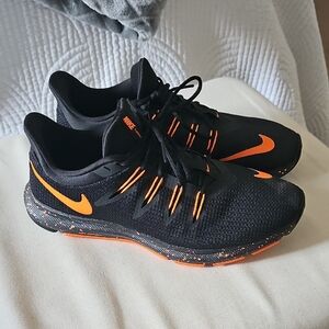 Nike Black and Orange Athletic Shoes with Sleek Design